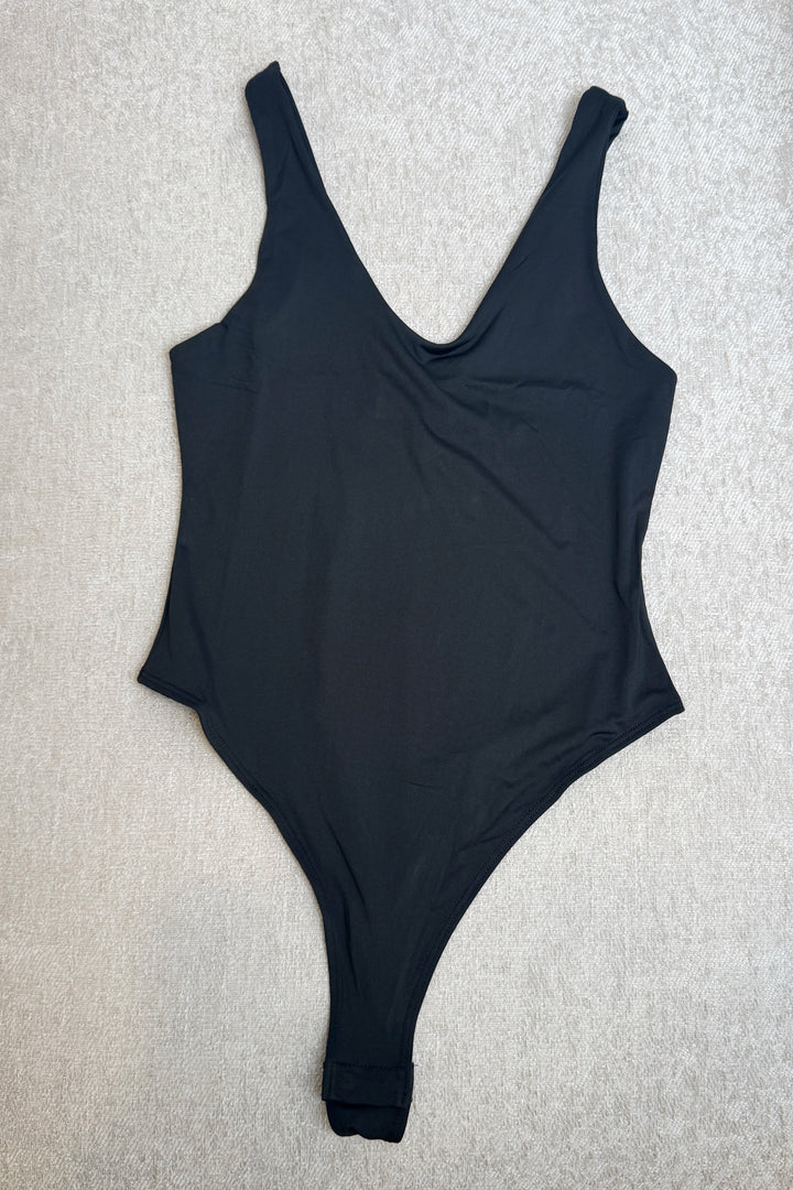 The Essential White Bodysuit