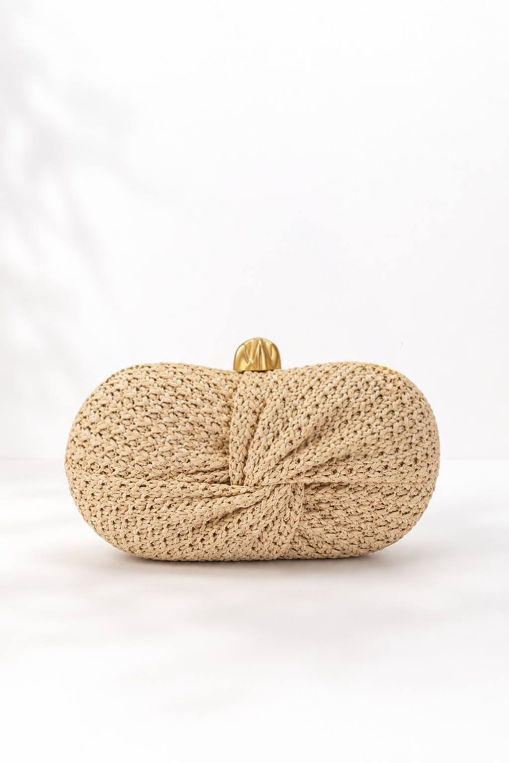 Into a knot Weave clutch