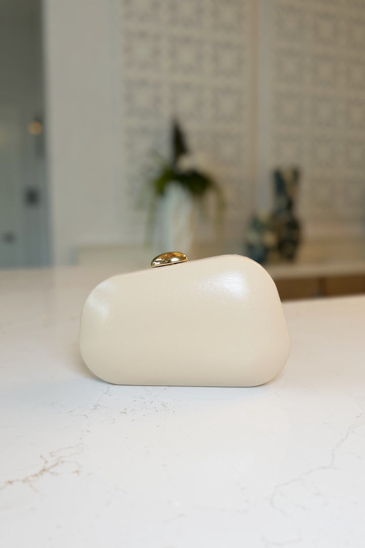 Asymmetrical Gold clasp Clutch