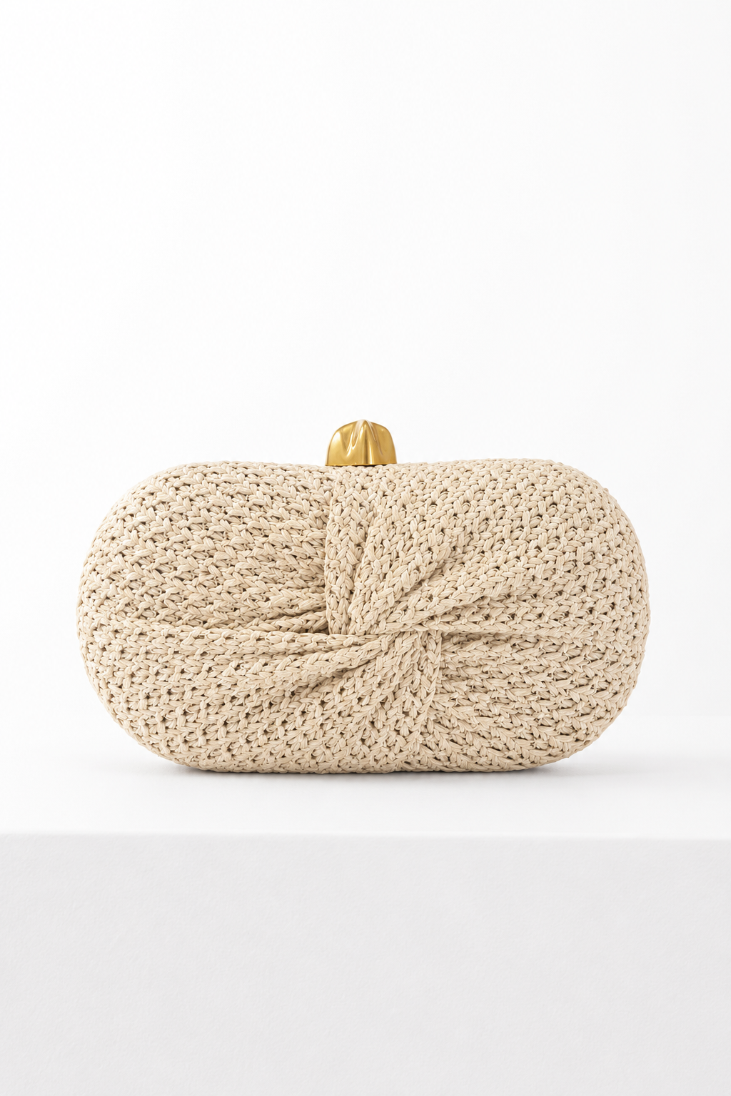 Into a knot Weave clutch