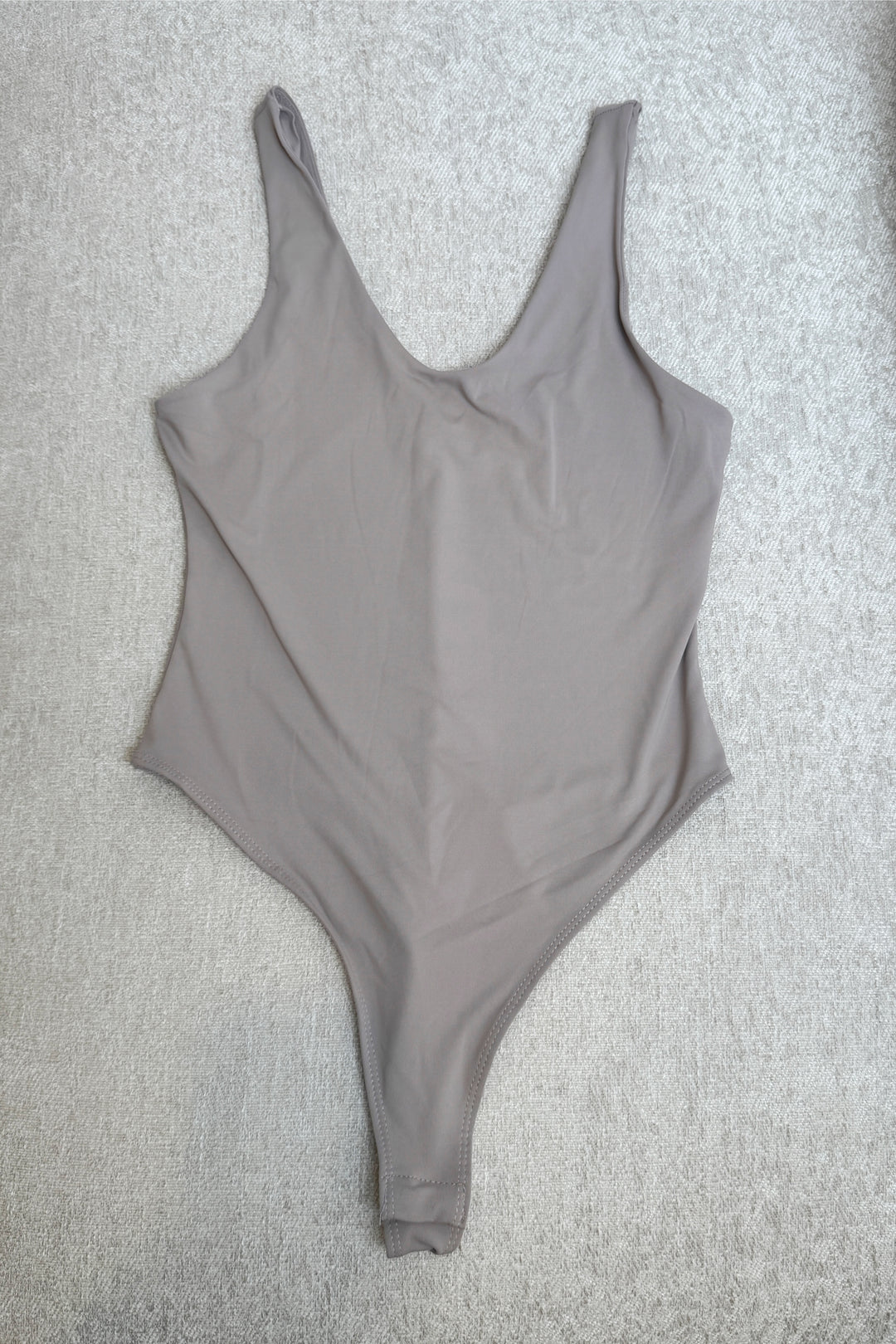 The Essential White Bodysuit