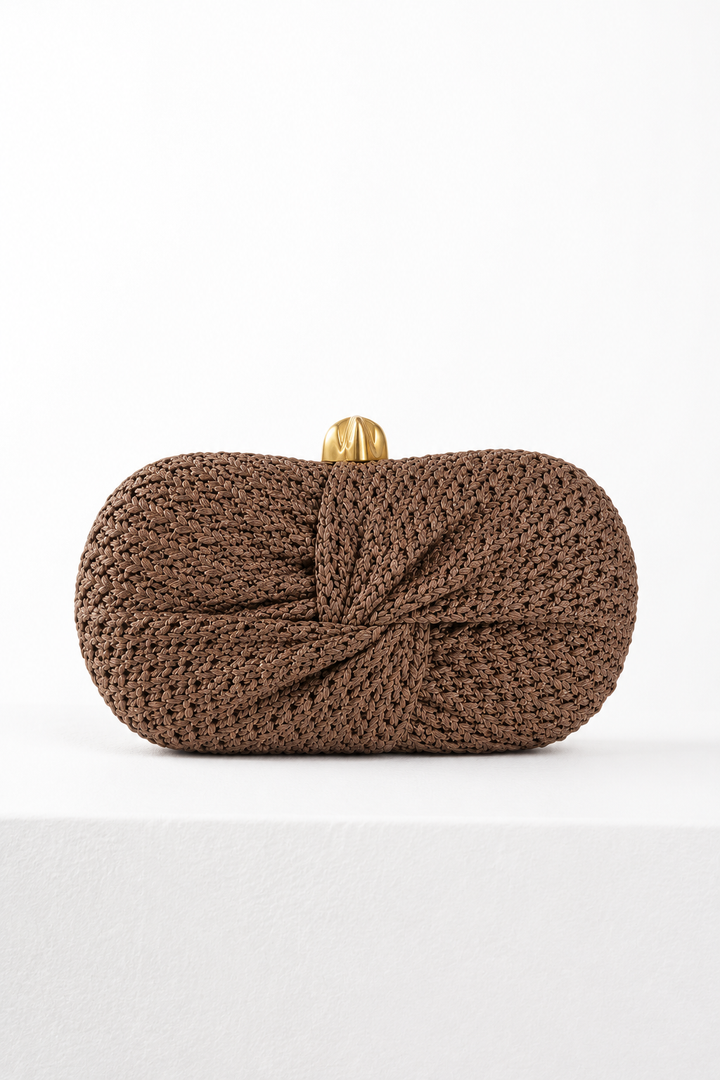 Into a knot Weave clutch