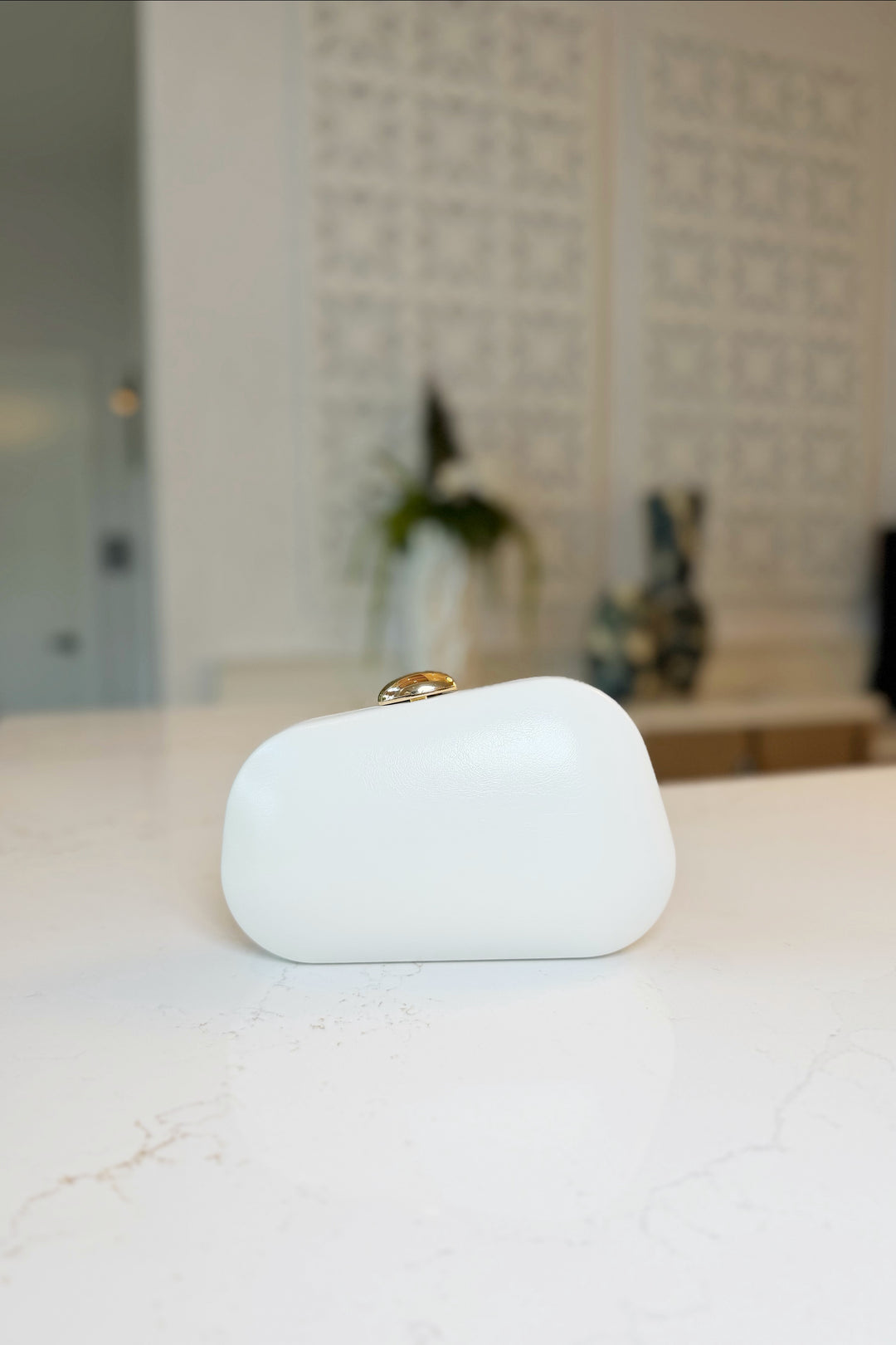 Asymmetrical Gold clasp Clutch