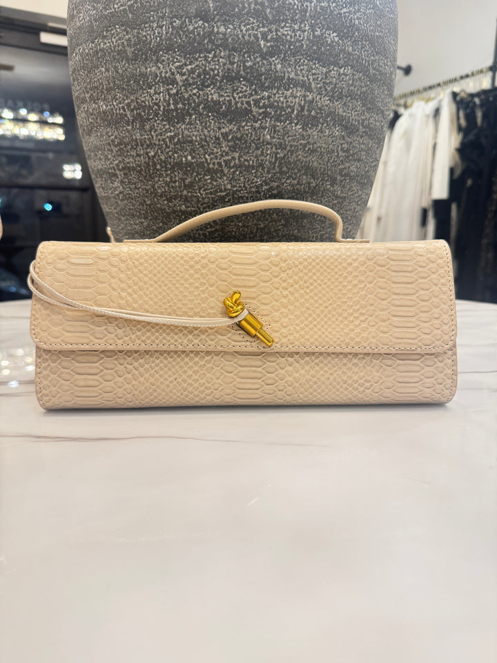 Knot detail wristlet clutch